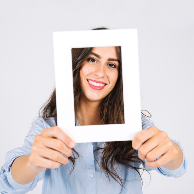 girl holding a frame